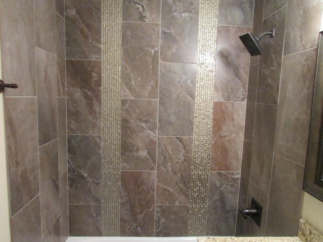 7719 East Prairie Road Skokie, IL 60076 - Photo 13 of 25 a bathroom with a shower