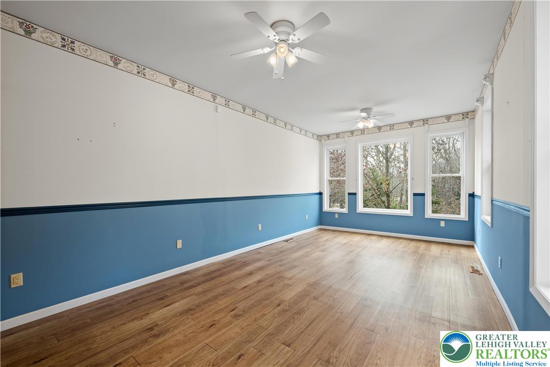 1 Pinewood Circle Hazleton, PA 18202 - Photo 15 of 33 wooden floor in an empty room with a window