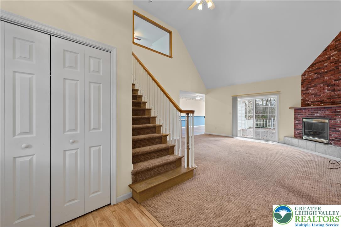 1 Pinewood Circle Hazleton, PA 18202 - Photo 7 of 33 a view of a livingroom with wooden floor and stairs