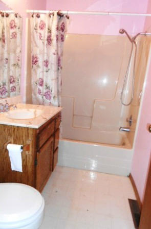 18870 Reeds Creek Road Red Bluff, CA 96080 - Photo 8 of 10 a bathroom with a sink a toilet and shower