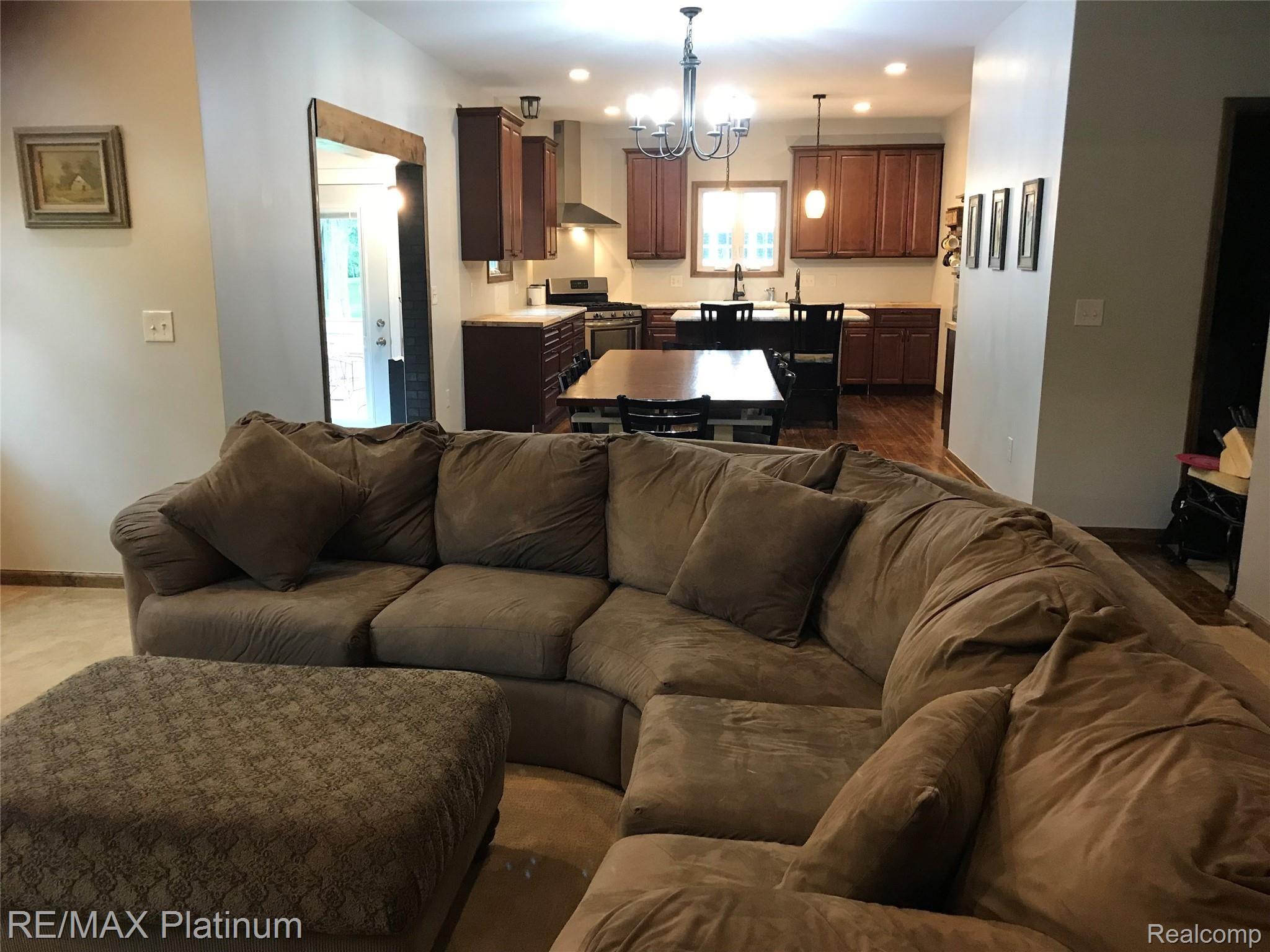 140 Inverness Street Howell, MI 48843 - Photo 11 of 34 VIEW OF KITCHEN FROM GREAT ROOM