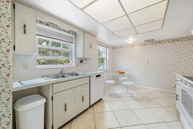 a bathroom with a sink a toilet and a bathtub