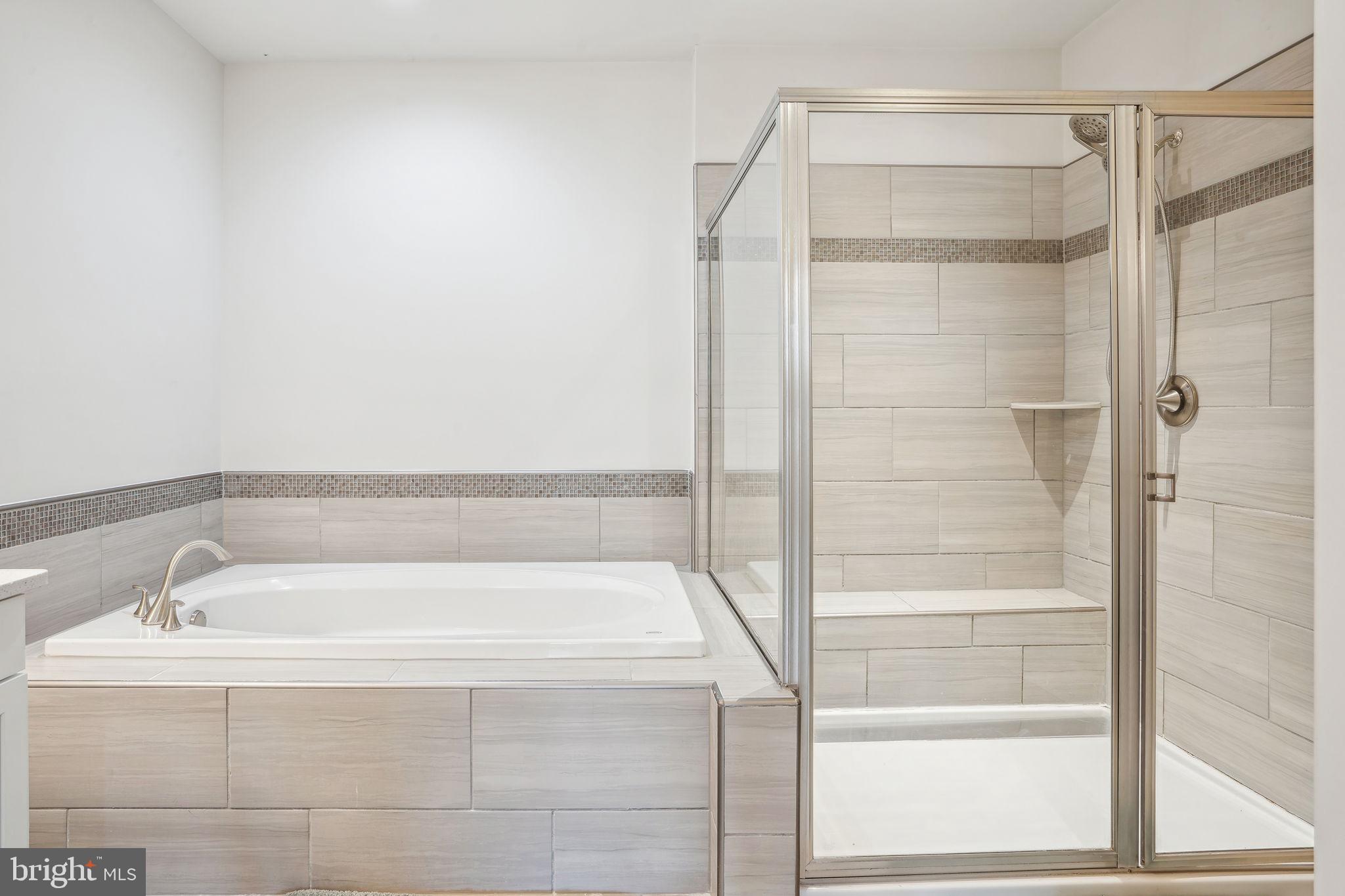7204 Islip Way, Unit A Hanover, MD 21076 - Photo 28 of 35 Soaking Tub and Shower in Ensuite