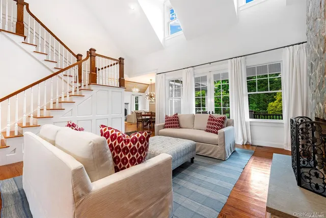 a living room with furniture or window and a wooden floor
