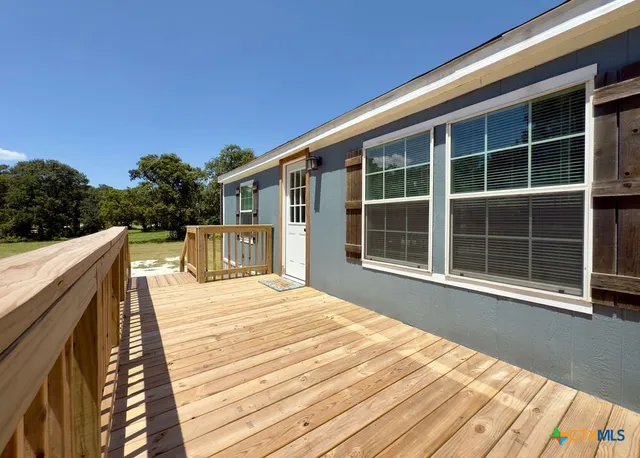a view of a house with a roof deck
