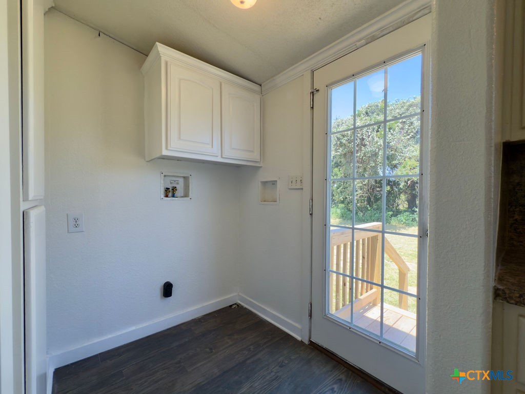 375 Alto Lane Waco, TX 76705 - Photo 15 of 27 an empty room with wooden floor and windows