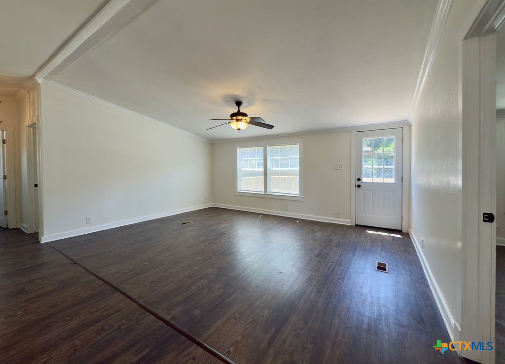 375 Alto Lane Waco, TX 76705 - Photo 16 of 27 an empty room with wooden floor and windows