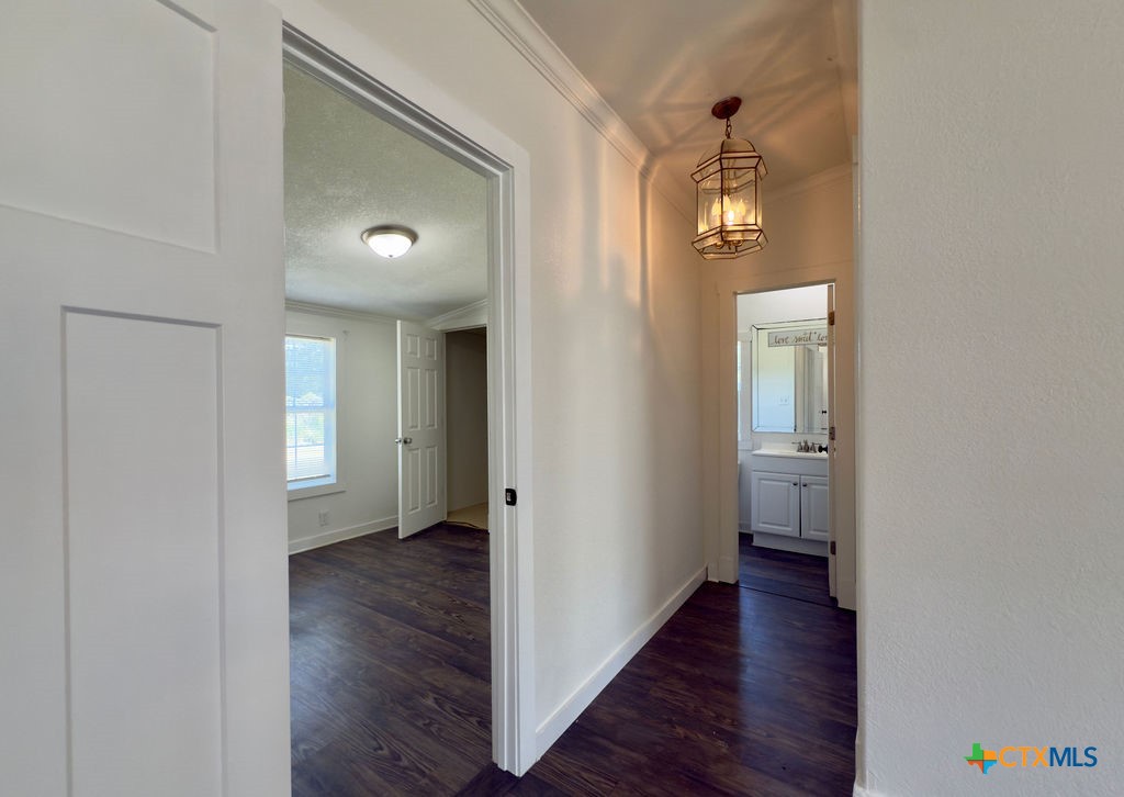 375 Alto Lane Waco, TX 76705 - Photo 22 of 27 a view of a hallway with wooden floor