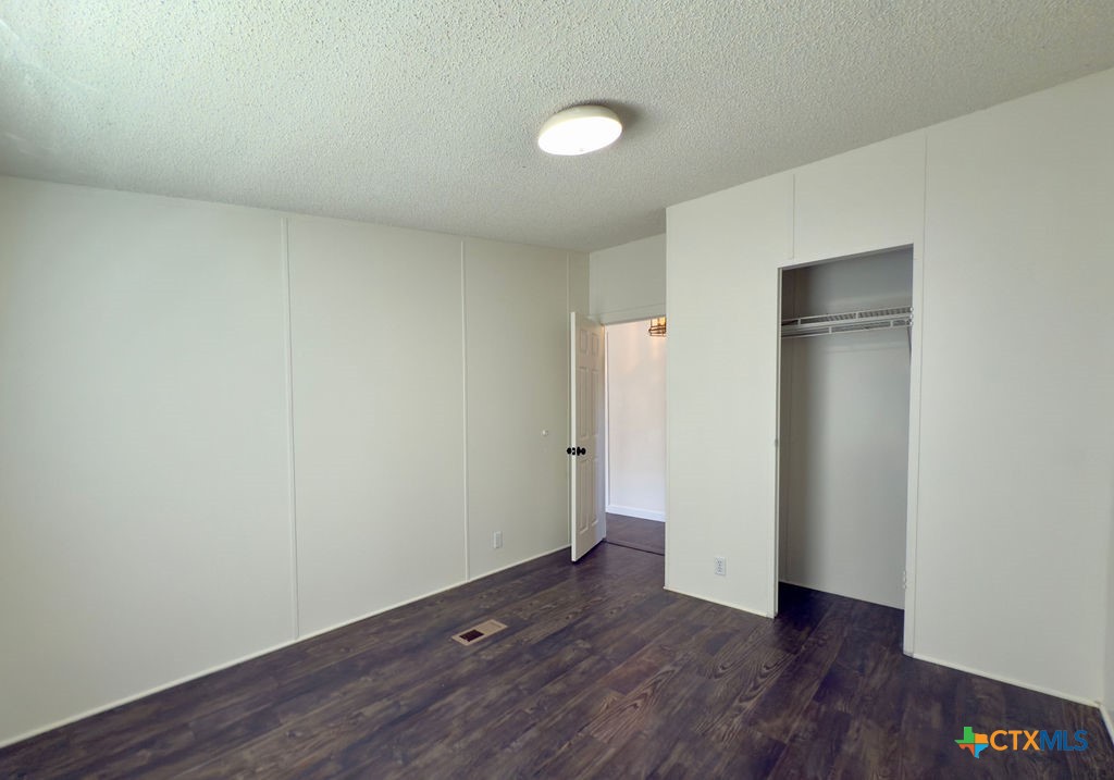 375 Alto Lane Waco, TX 76705 - Photo 25 of 27 a view of an empty room with wooden floor