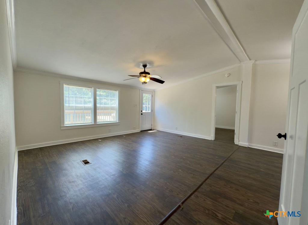 375 Alto Lane Waco, TX 76705 - Photo 27 of 27 an empty room with wooden floor and windows