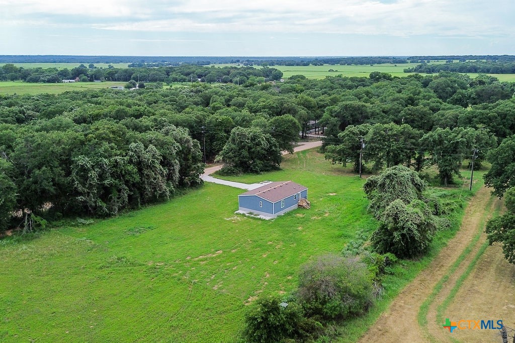 375 Alto Lane Waco, TX 76705 - Photo 6 of 27 a view of a field with plants and trees around