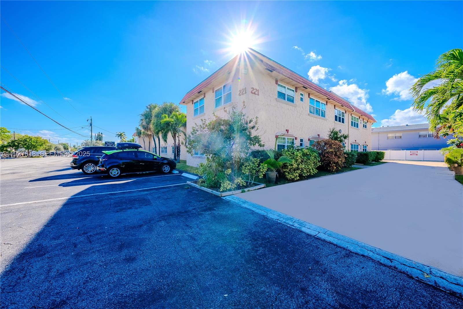 221 Southeast 9th Avenue, Unit 202 Pompano Beach, FL 33060 - Photo 11 of 19 a view of a yard in front of house