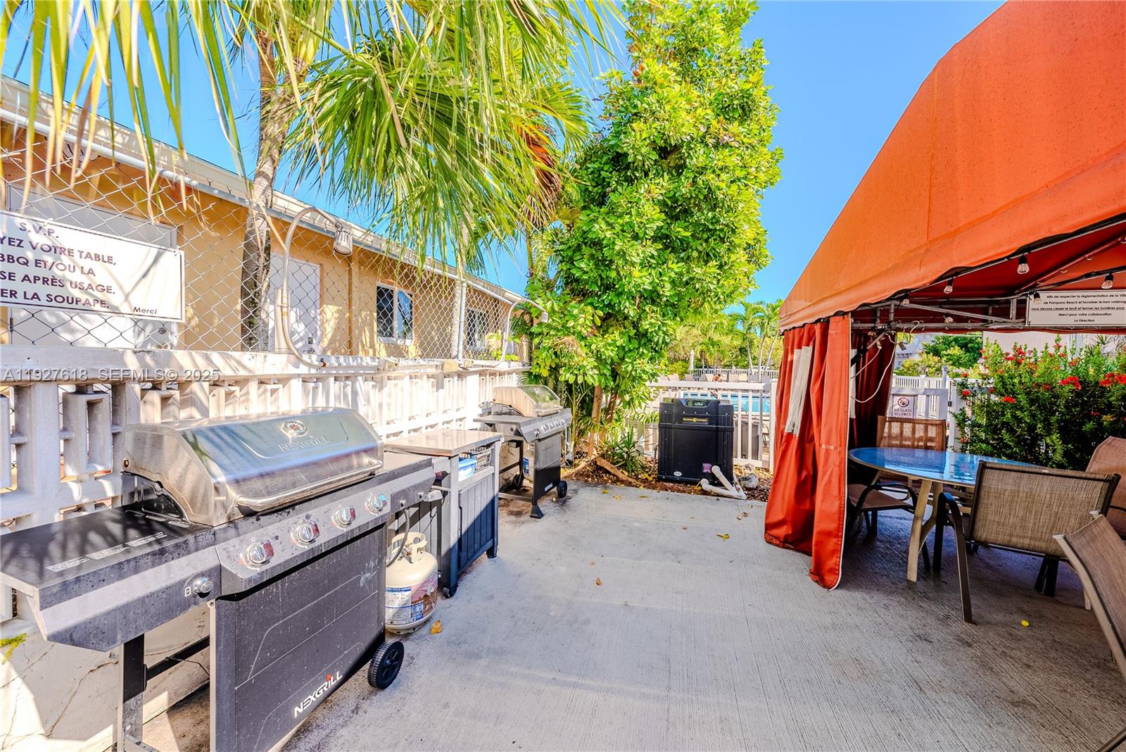 221 Southeast 9th Avenue, Unit 202 Pompano Beach, FL 33060 - Photo 15 of 19 a view of an outdoor sitting space