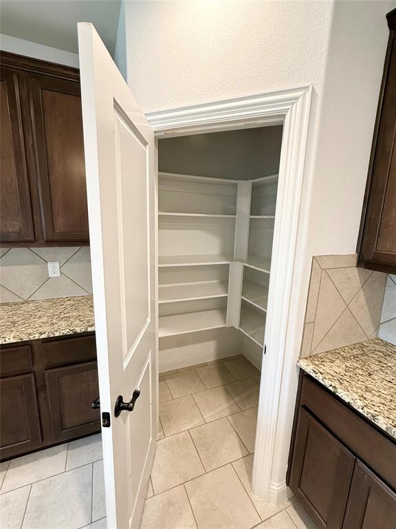 204 Flower Ridge Drive Fort Worth, TX 76108 - Photo 15 of 27 a view of storage and utility