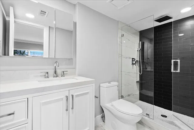 a bathroom with a sink and mirror