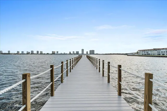 a view of swimming pool with outdoor seating