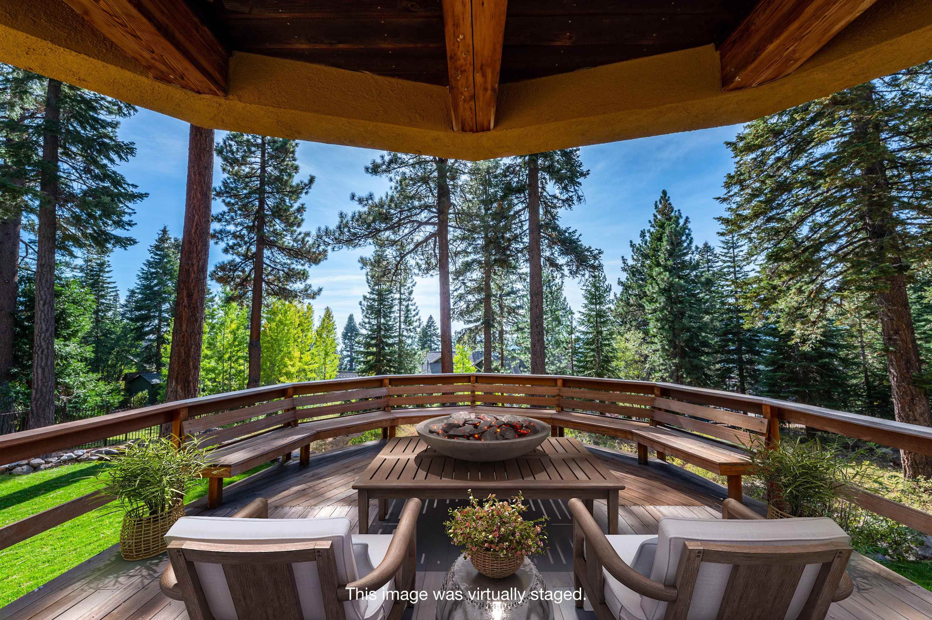 a view of a chair and table in the balcony
