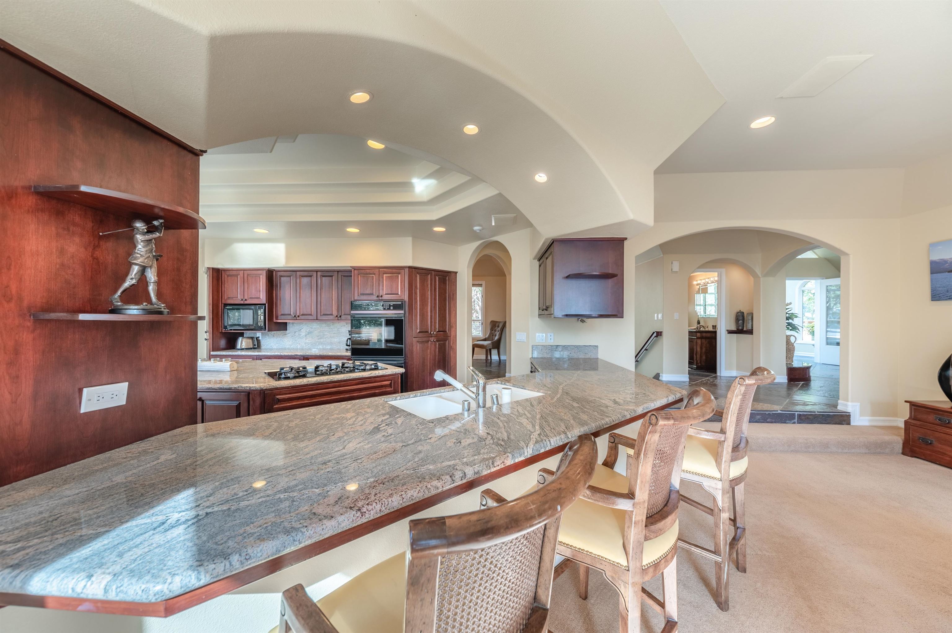 949 Fairview Boulevard Incline Village, NV 89451 - Photo 2 of 21 a view of a kitchen with kitchen island a counter top space appliances and cabinets