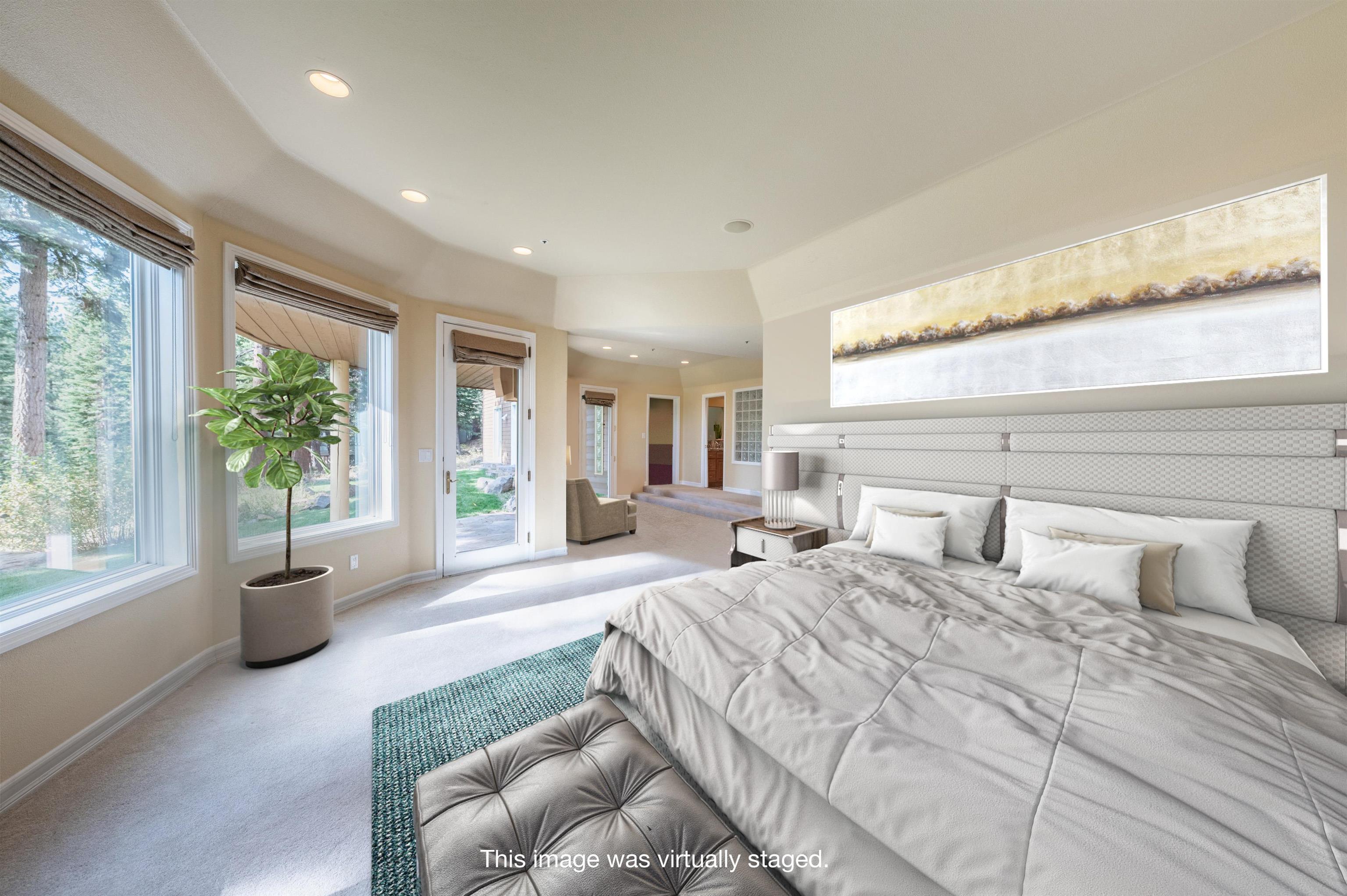 949 Fairview Boulevard Incline Village, NV 89451 - Photo 17 of 21 a bedroom with a large bed couch and large windows