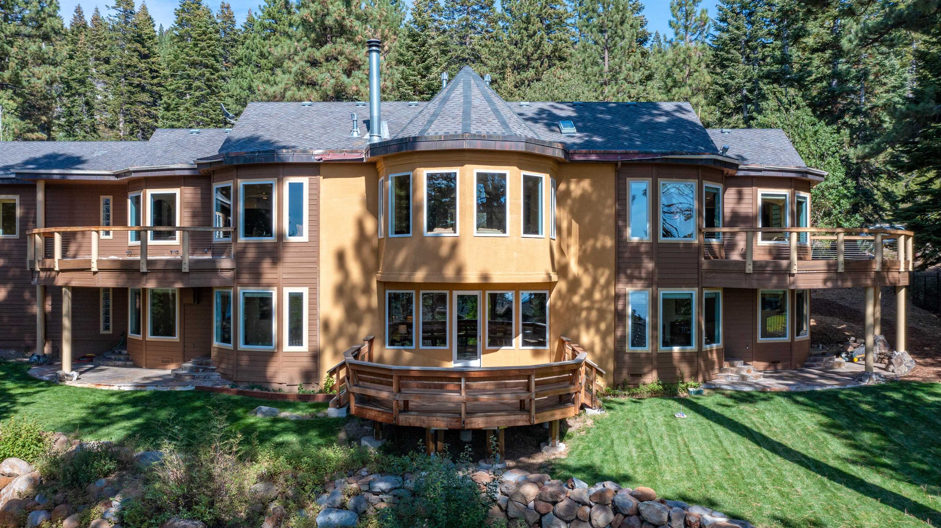 949 Fairview Boulevard Incline Village, NV 89451 - Photo 6 of 21 a front view of a house with a garden