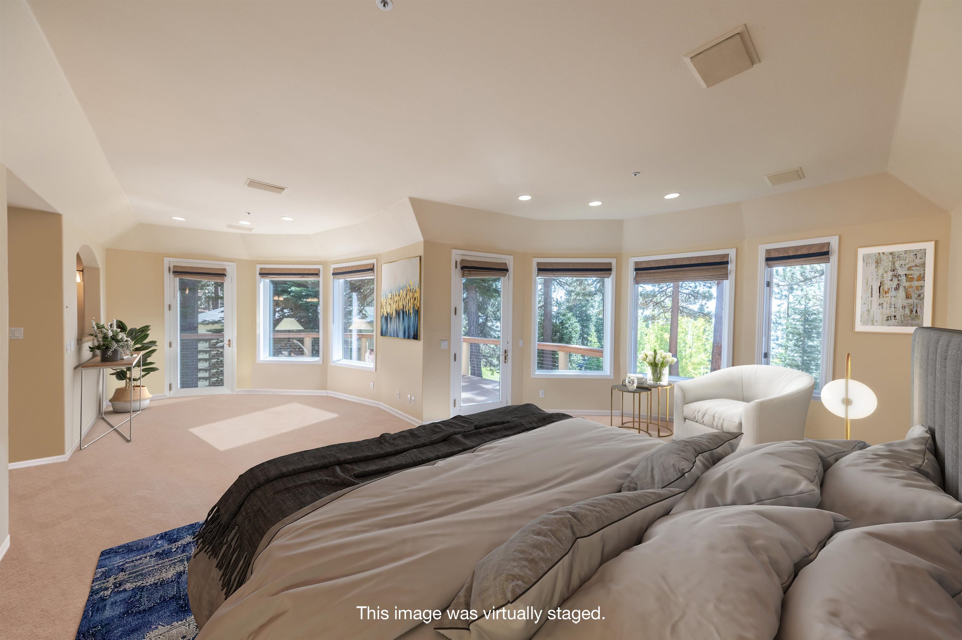 949 Fairview Boulevard Incline Village, NV 89451 - Photo 8 of 21 a bedroom with a large bed and windows