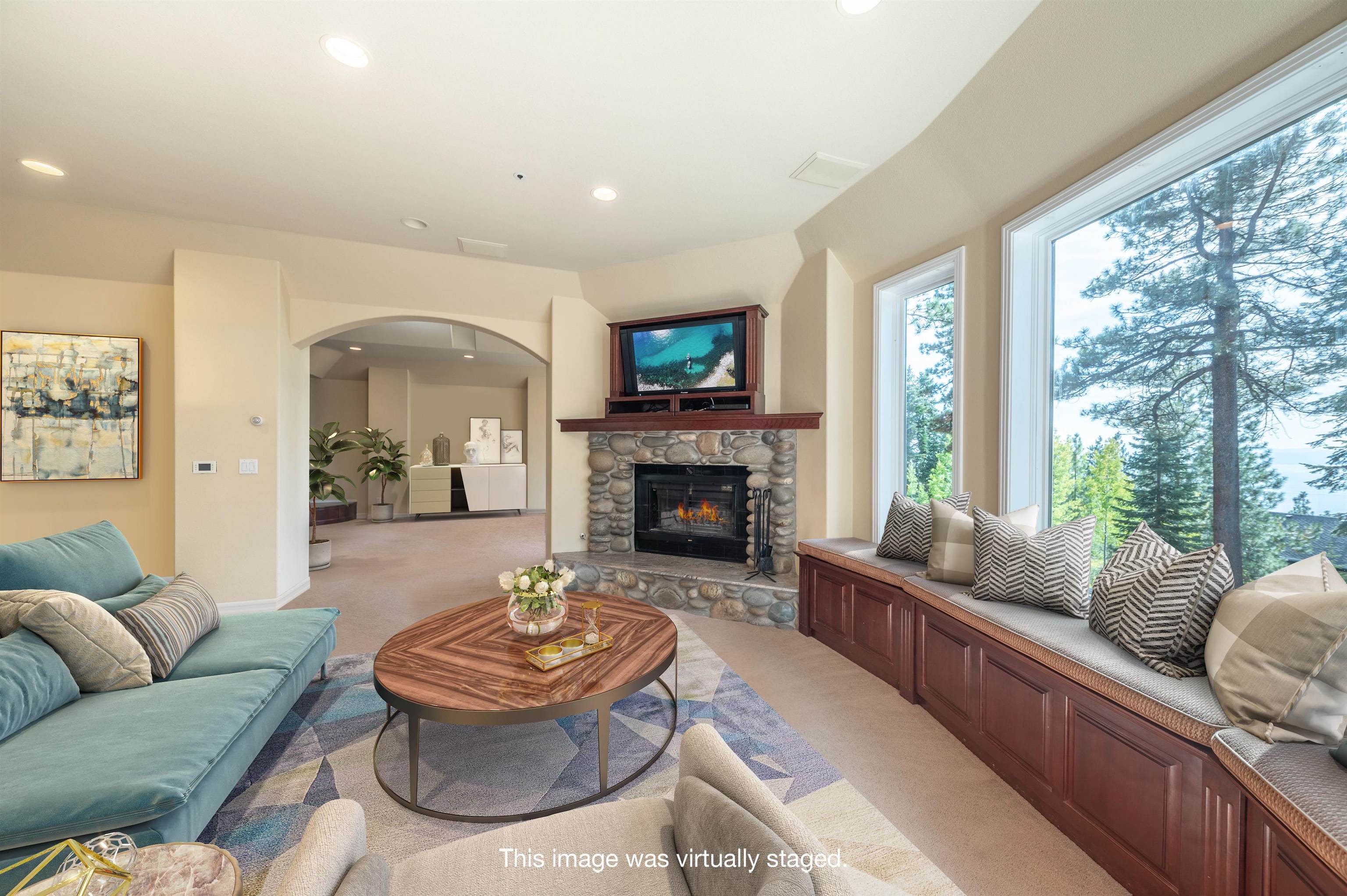 949 Fairview Boulevard Incline Village, NV 89451 - Photo 10 of 21 a living room with furniture a fireplace and a large window