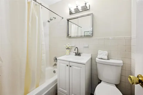 a view of a lobby with furniture and floor to living room