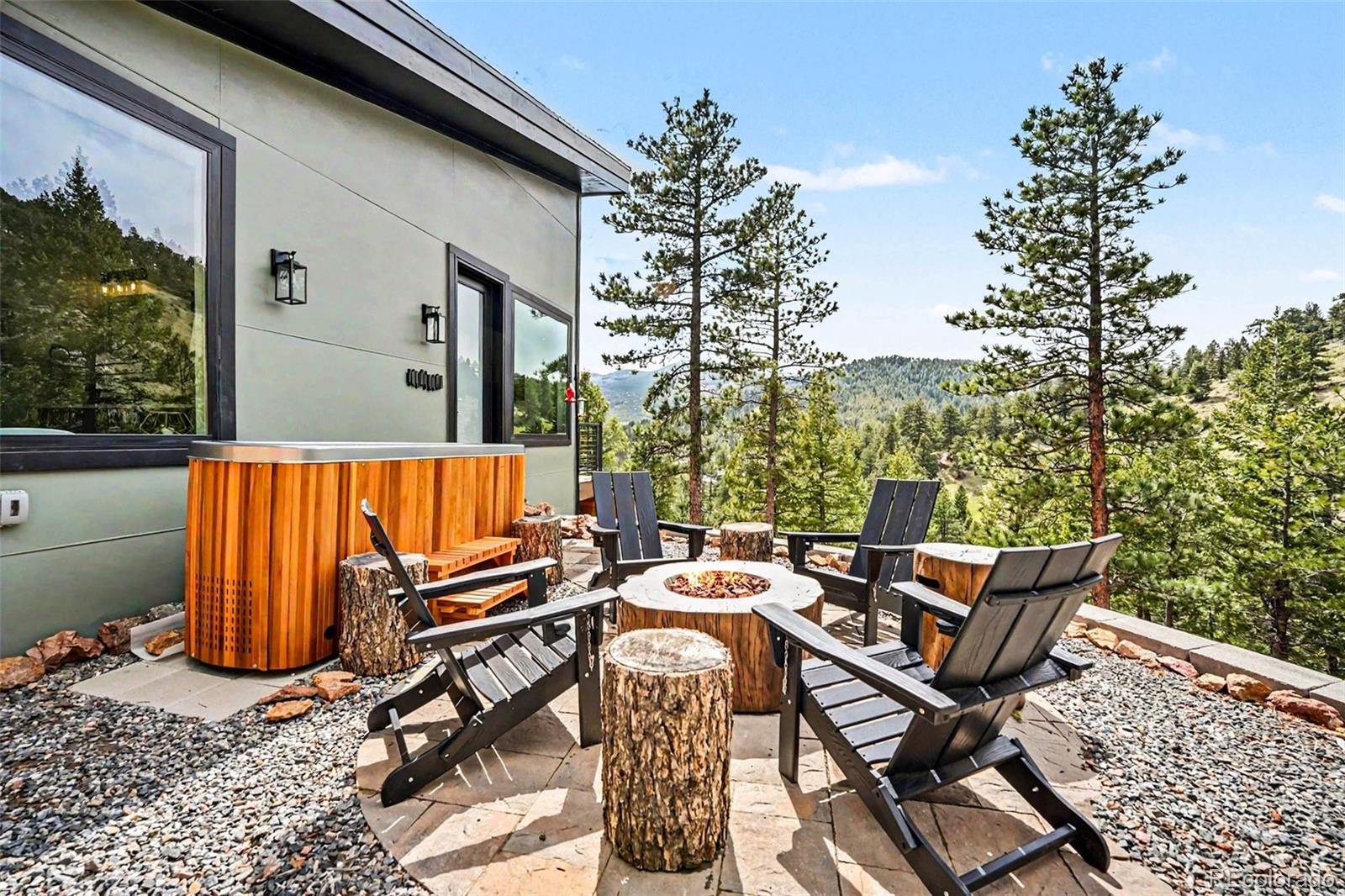 7231 Timber Trail Road Evergreen, CO 80439 - Photo 31 of 35 a view of outdoor space with seating area