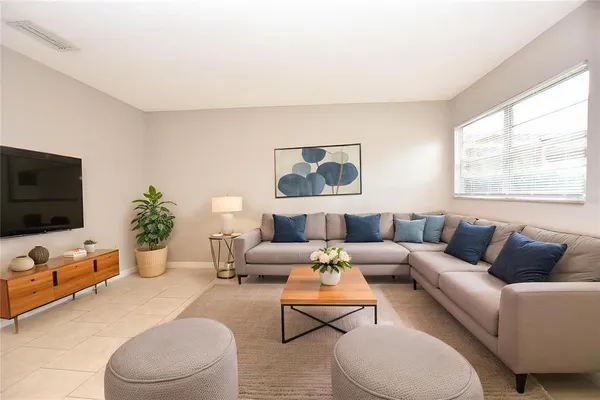 a view of an empty room with a window