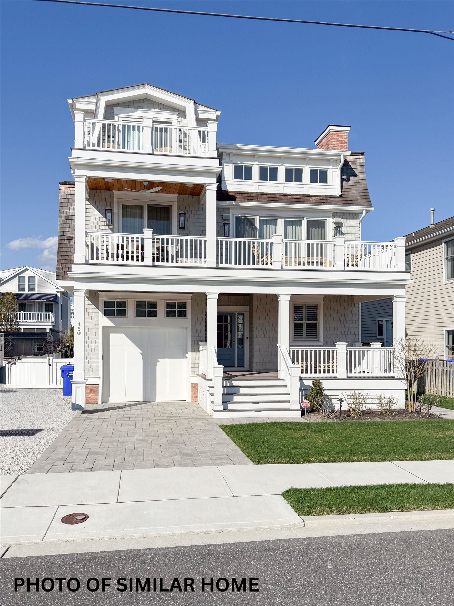 76 21st Street Avalon, NJ 08202 - Photo 4 of 4 a front view of a house with a yard