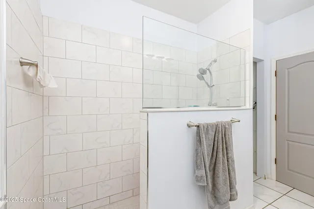 a bedroom with furniture and wooden floor