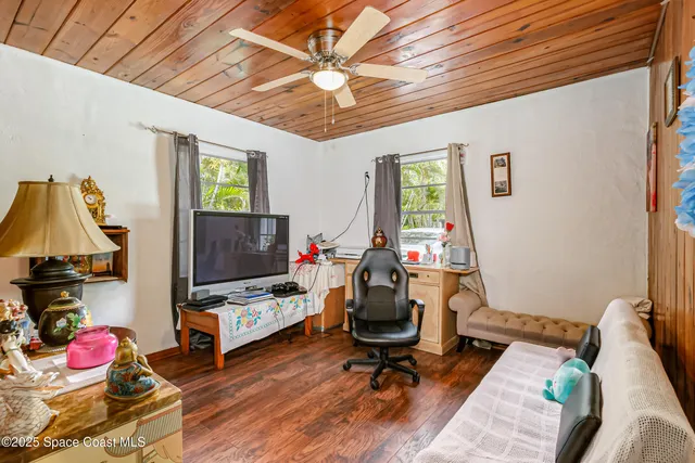 a backyard of a house with seating space