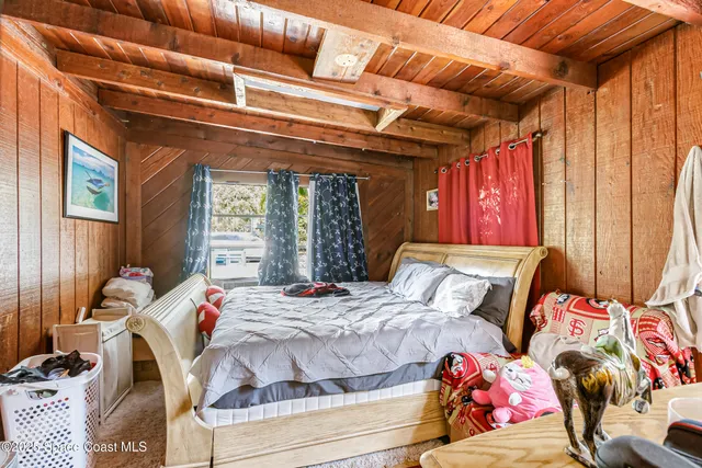 a front view of a building with a swimming pool