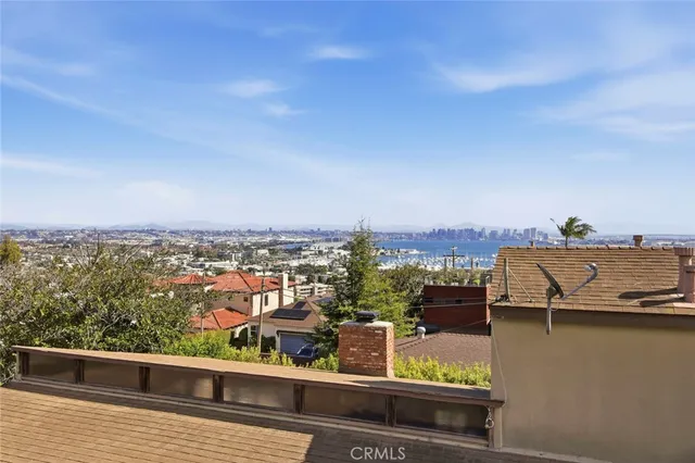 a view of a balcony with city view