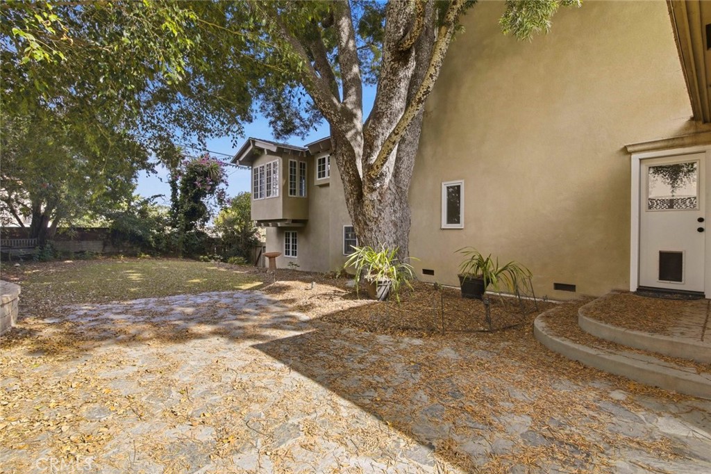 3320 Hill San Diego Ca San Diego, CA 92106 - Photo 37 of 39 a row of palm trees in front of a house