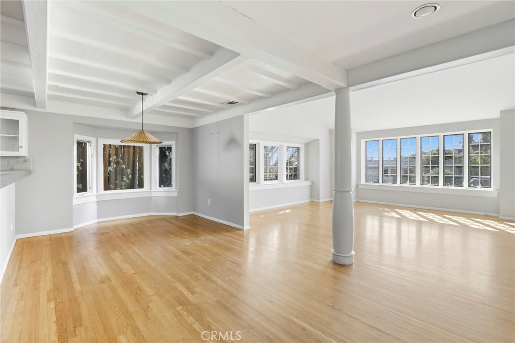3320 Hill San Diego Ca San Diego, CA 92106 - Photo 7 of 39 a view of an empty room with wooden floor and a window
