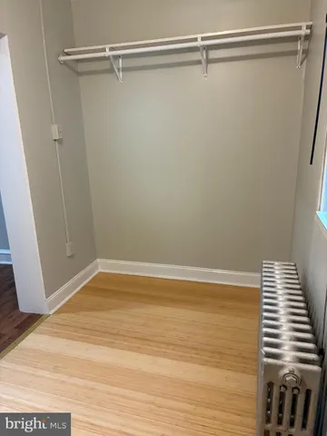 a view of small space with racks on the wall