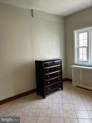 a view of room with cabinets