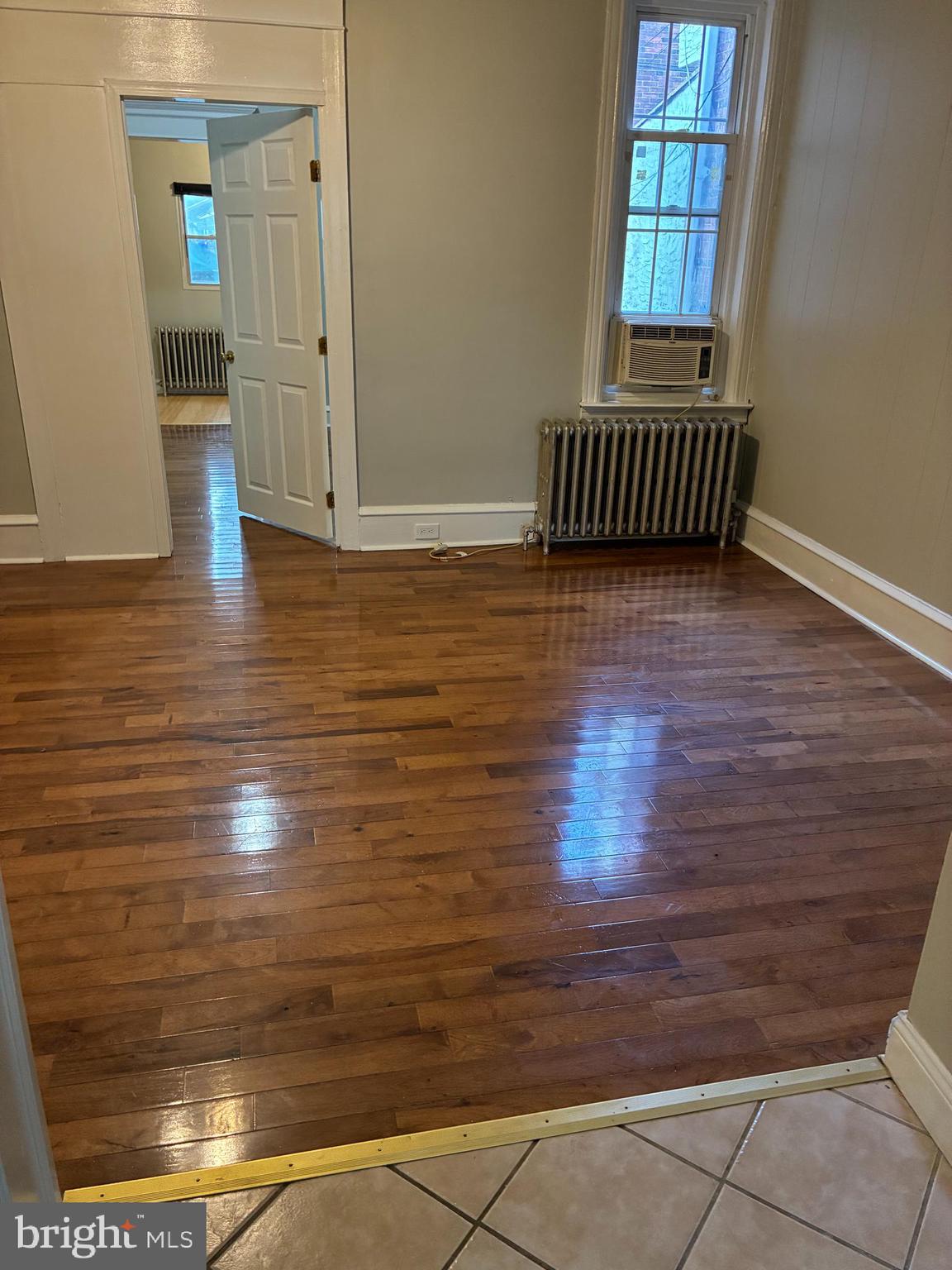 1410 West Porter Street Philadelphia, PA 19145 - Photo 7 of 17 a view of room with window and wooden floor