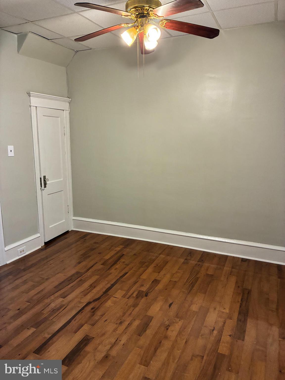 1410 West Porter Street Philadelphia, PA 19145 - Photo 8 of 17 wooden floor in an empty room