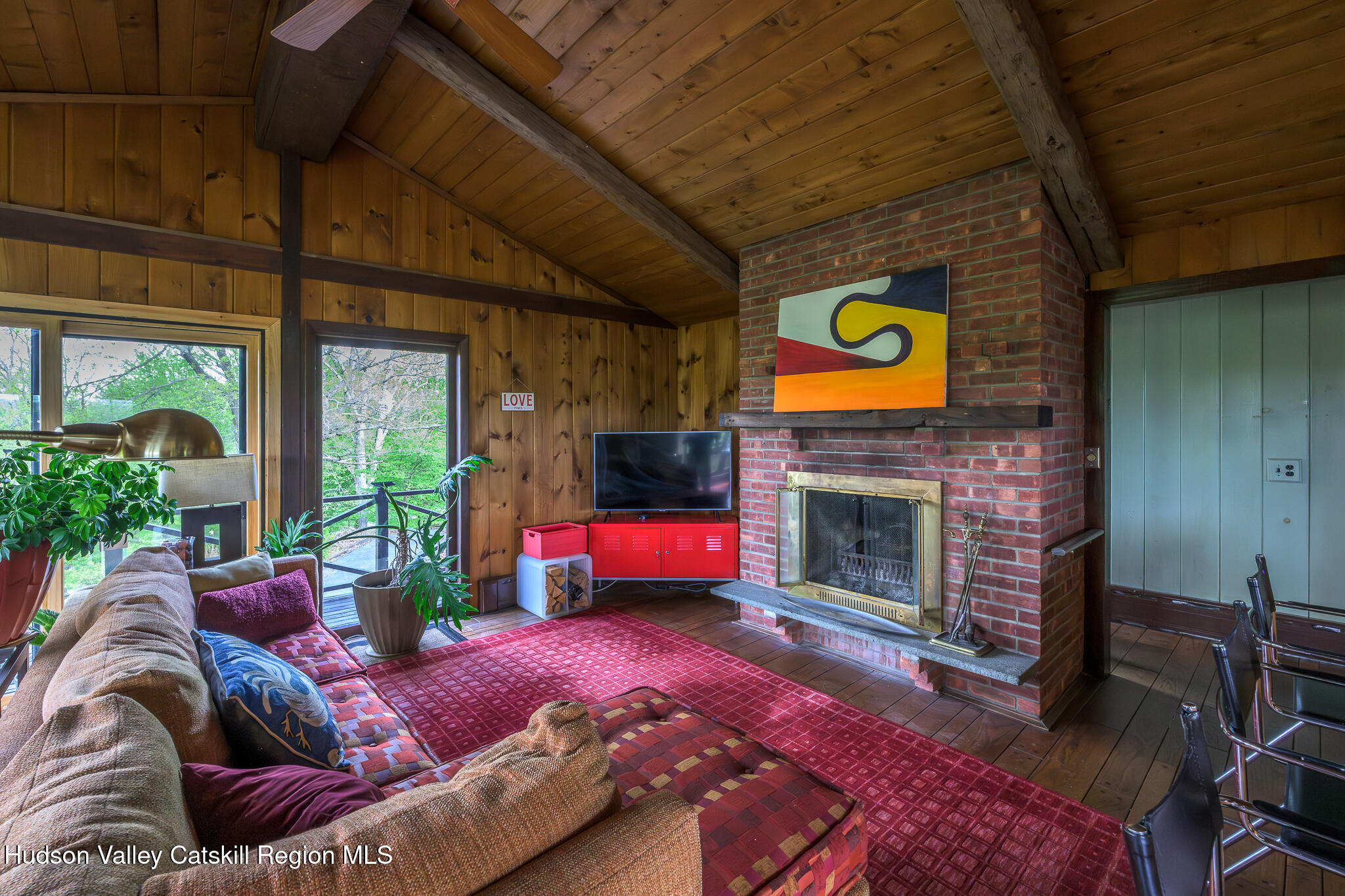 29 Edgemere Hill Road Catskill, NY 12414 - Photo 8 of 38 a living room with furniture and a fireplace