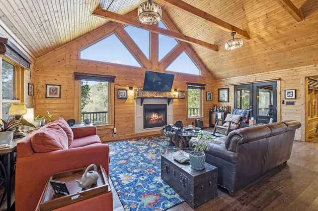 a kitchen with a sink appliances cabinets and furniture
