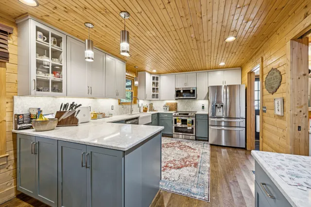 a bedroom with a bed and a closet