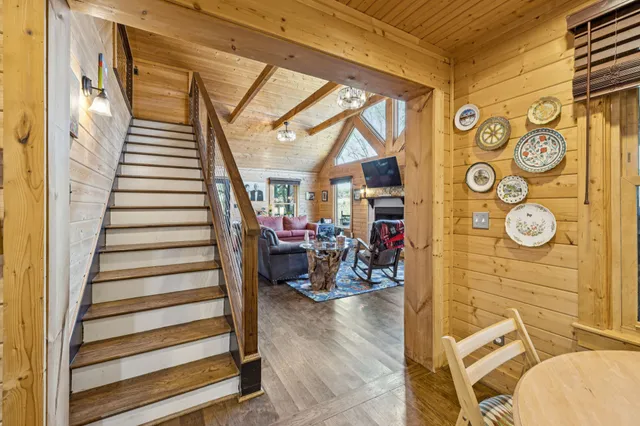 a bathroom with a tub and shower