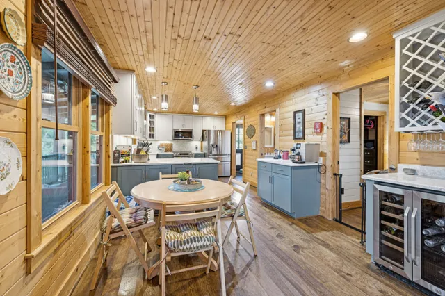 a bathroom with a double vanity sink and mirror