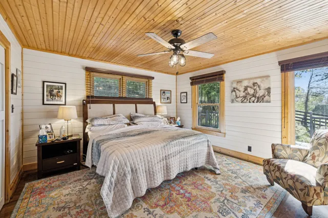 a view of a city from a dining room with wooden floor