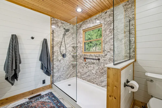 a view of a balcony with trees