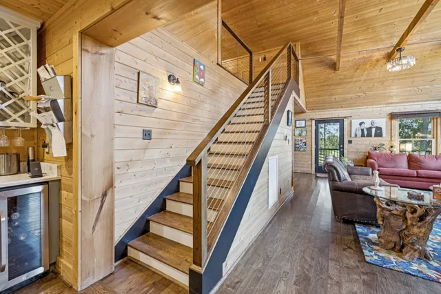 a view of a yard with large trees