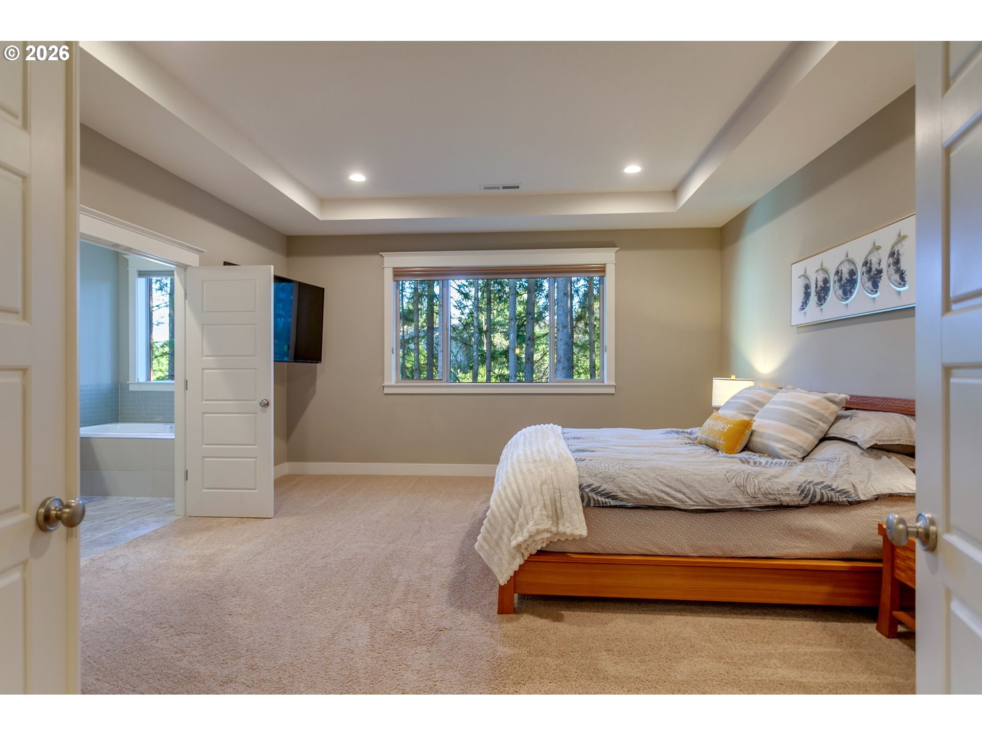 14390 Southwest Fox Lane Beaverton, OR 97008 - Photo 26 of 47 a bedroom with a large bed and a window