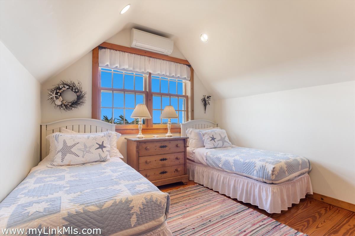 13 Eat Fire Spring Road Nantucket, MA 02554 - Photo 29 of 43 a bedroom with a bed window and a dresser
